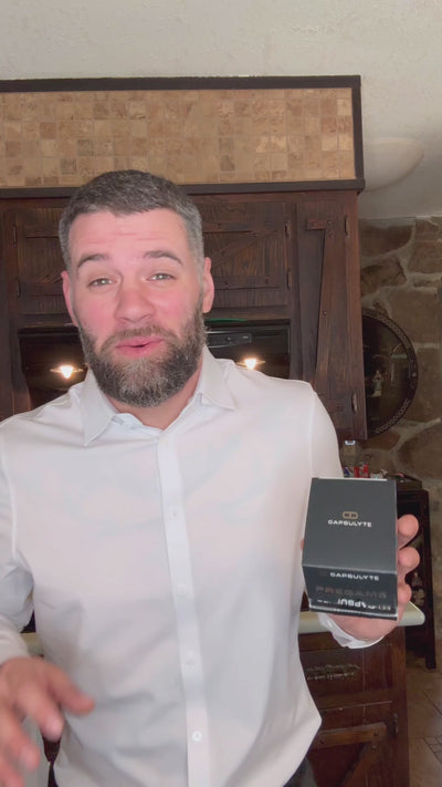 Man holding a Capsulyte Pregame box in a video thumbnail, sharing his positive experience using the hangover prevention supplement after a night out with clients, highlighting its benefits for working professionals.